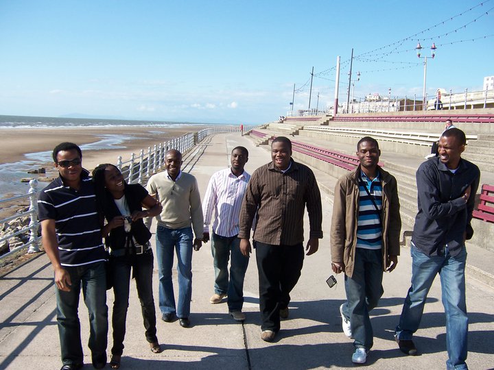 From Left to Right – Ezeocha Post’s Chinedu Ezeocha (wearing shades), Eseosa Sowemimo, Akin Omoyoruba, Michael Amankwa, Ebitari Tekenah (of blessed memory), Chikelue Uwafili (in stripped T-Shirt and jacket), and Dilioha Igbo (far right). Blackpool, England. June 2008.